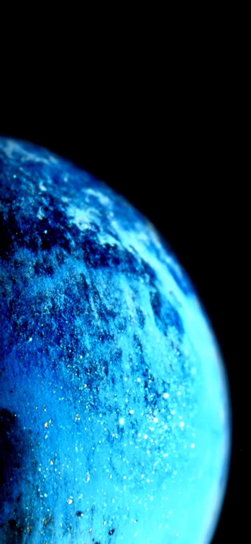 o planetă albastră pe un fundal negru Fundal