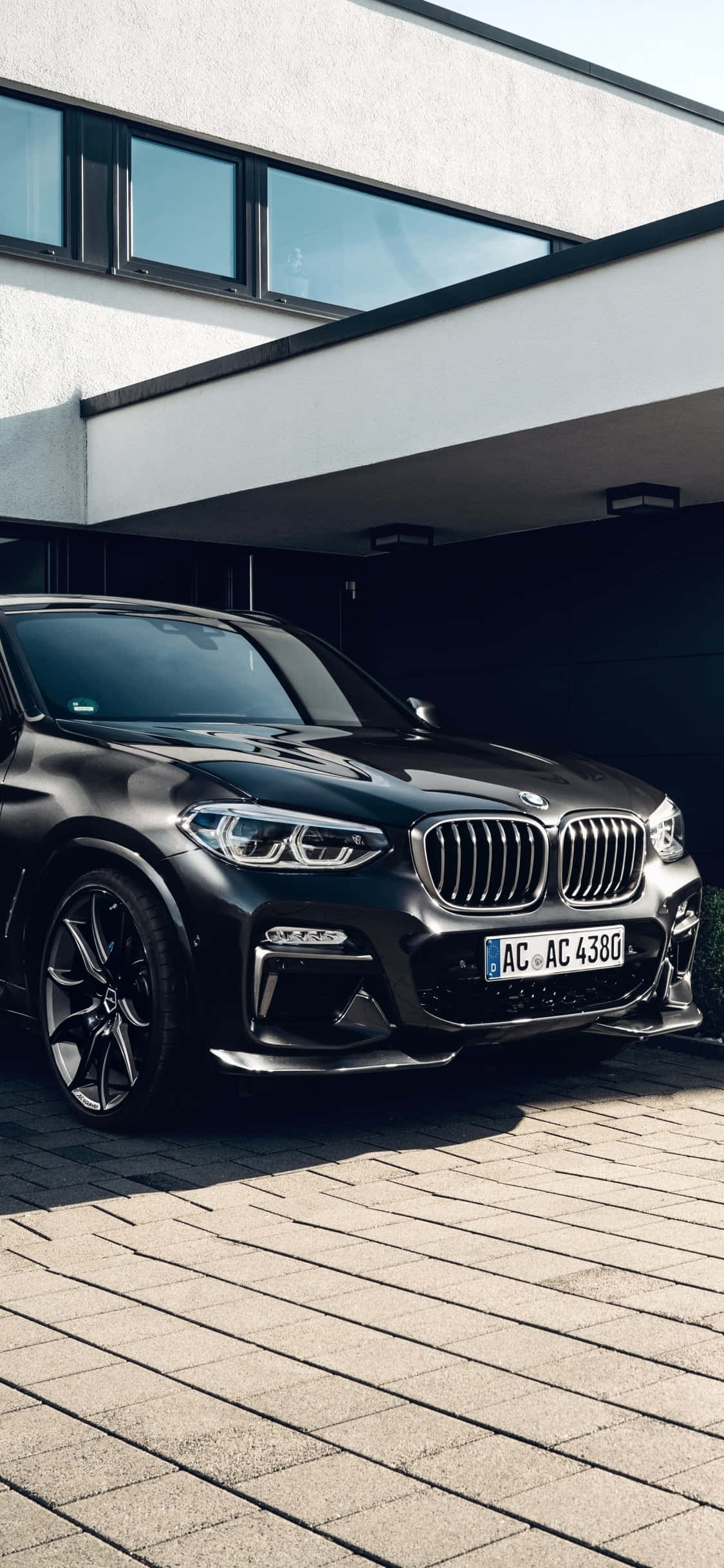 O plimbare frumoasă în BMW, alimentată de iPhone X Fundal