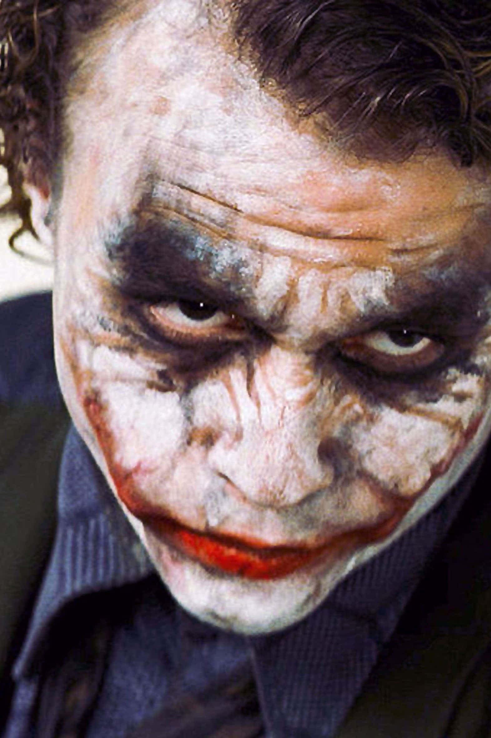 O privire în mintea infamului Joker Fundal