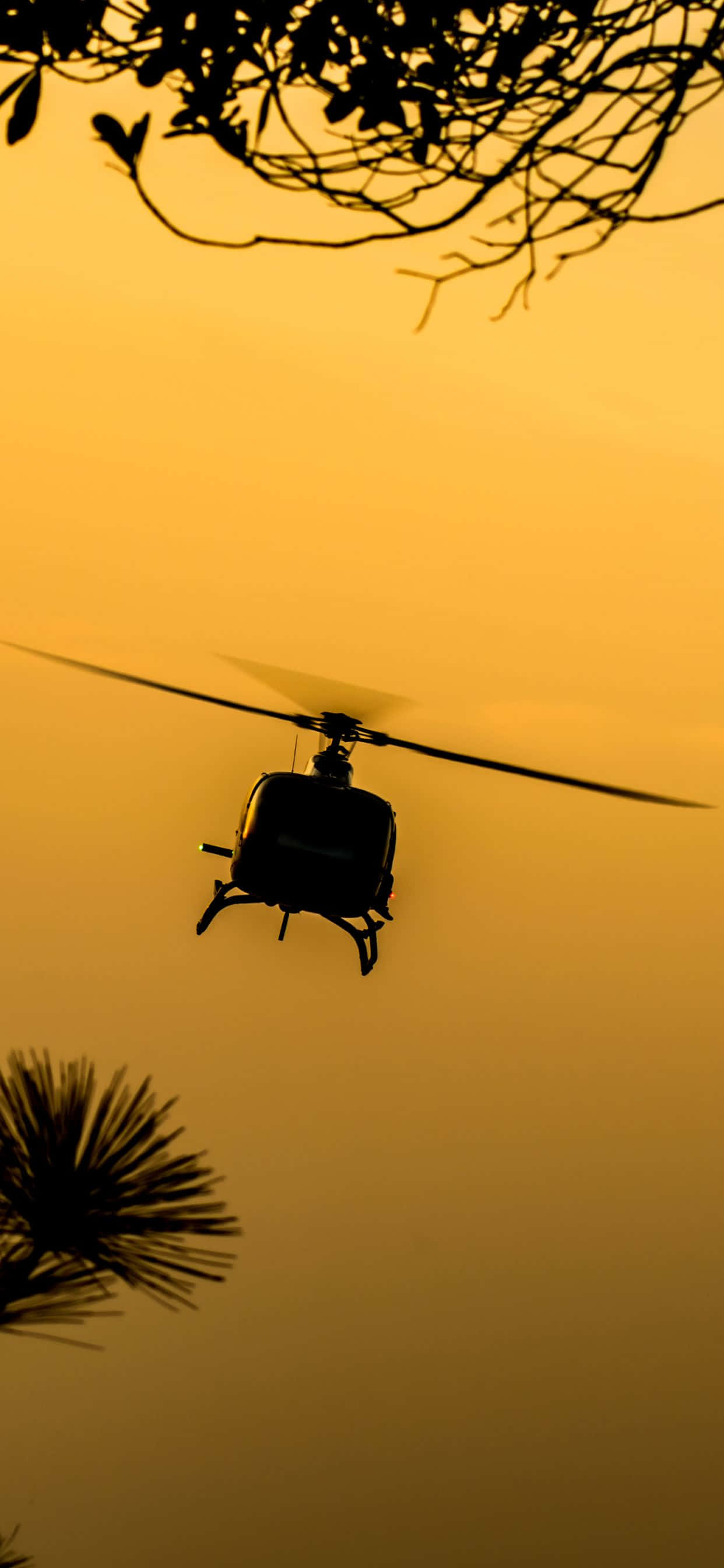 O vedere aeriană a unui elicopter elegant care transportă noul iPhone Xs Max Fundal