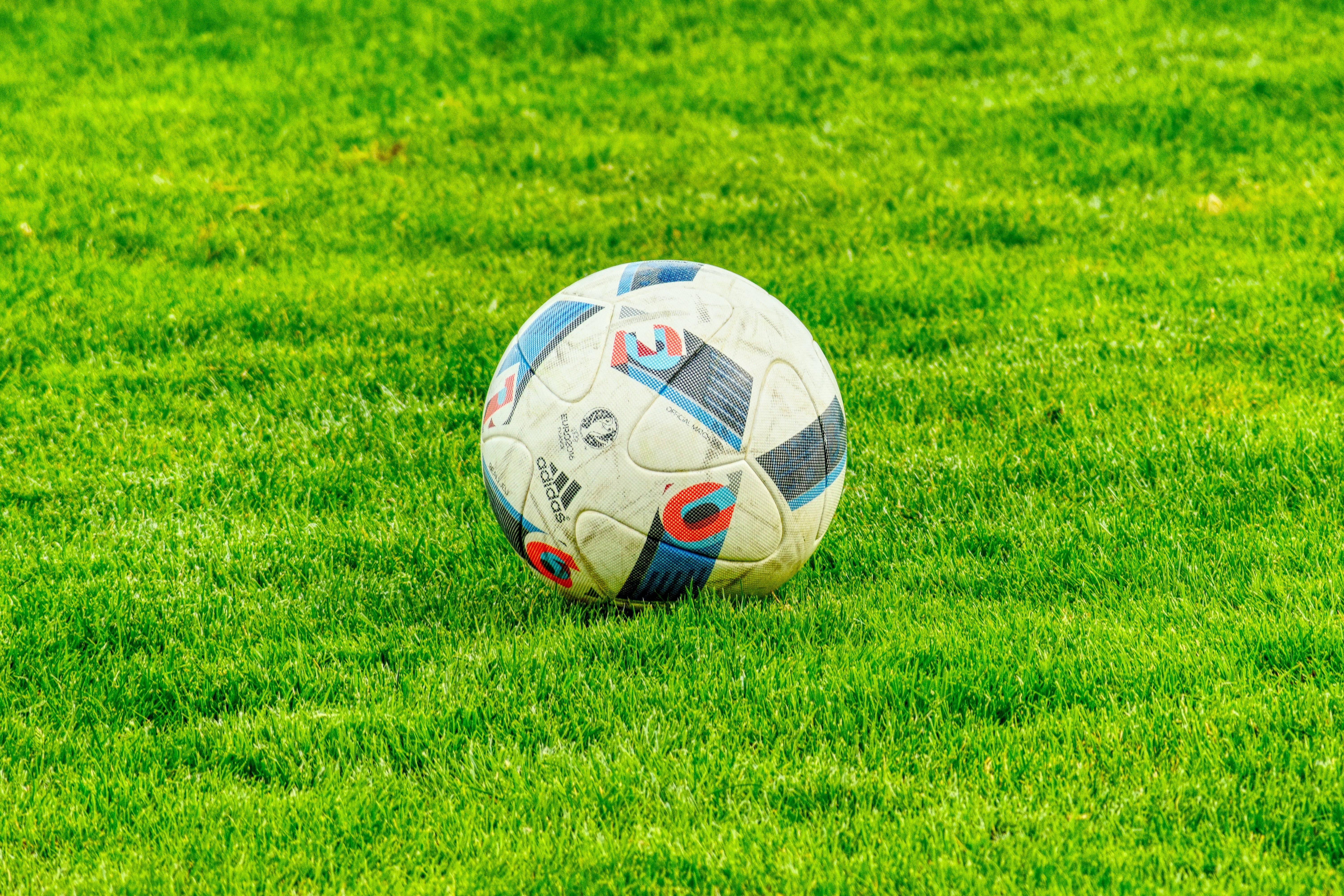 Pășește pe Terenul Verde de Fotbal Fundal