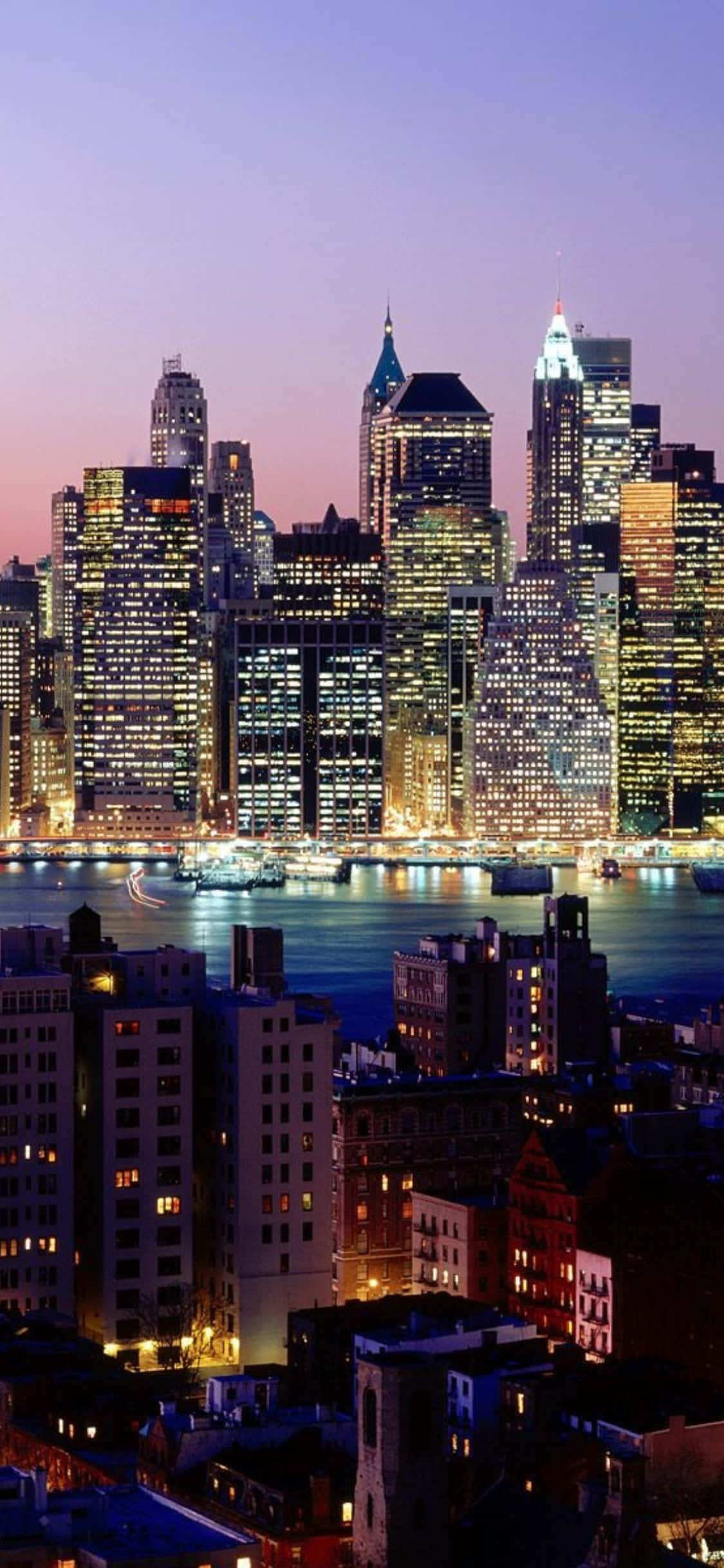 Peisaj urban fascinant al New York City văzut de pe iPhone Xs Fundal