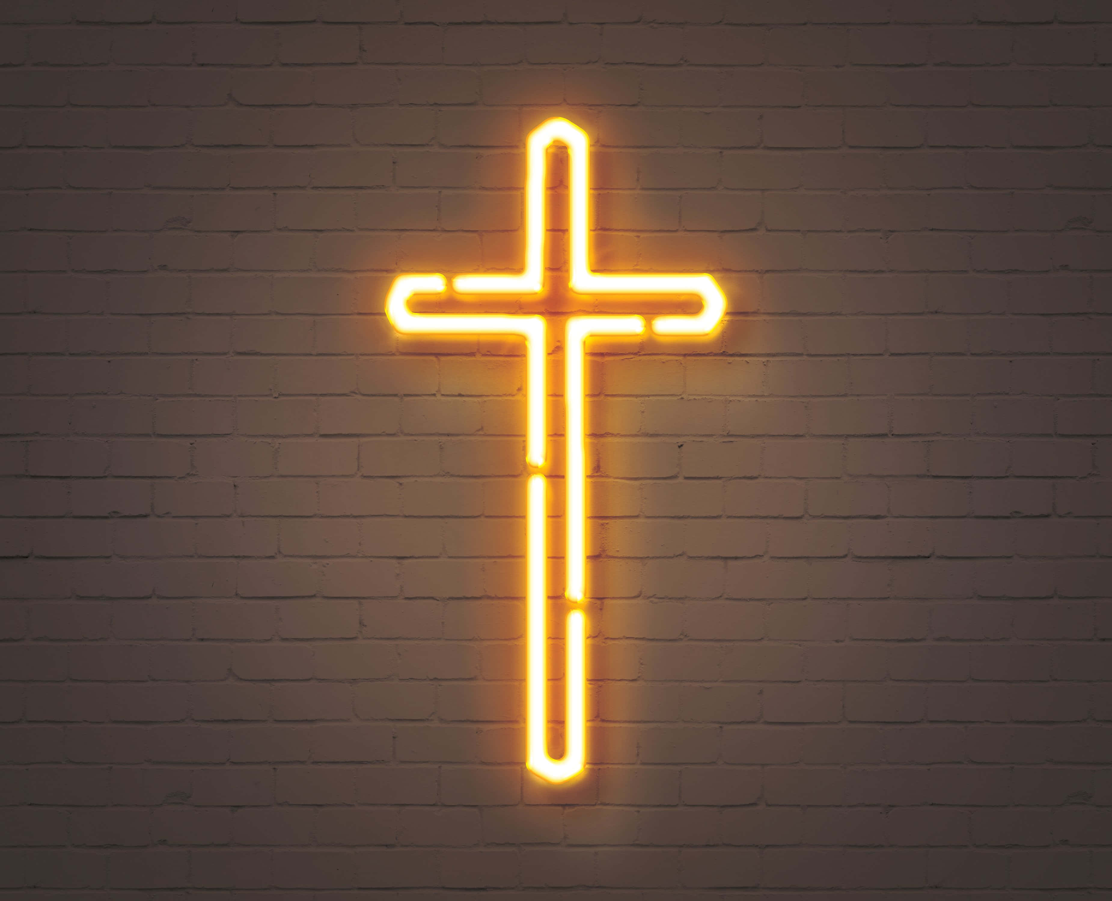Perete din cărămidă cu cruce neon Fundal