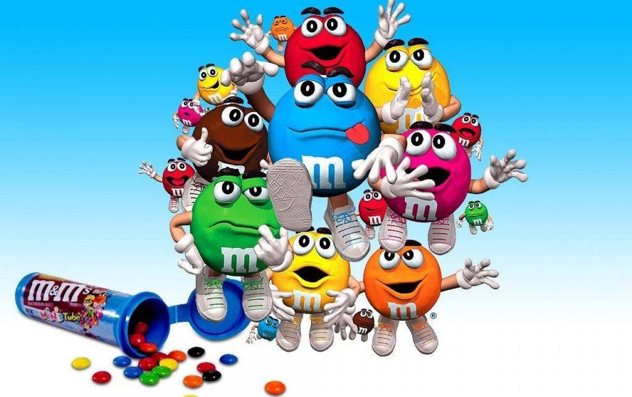 Personaje de ciocolată M&M colorate și variate Fundal