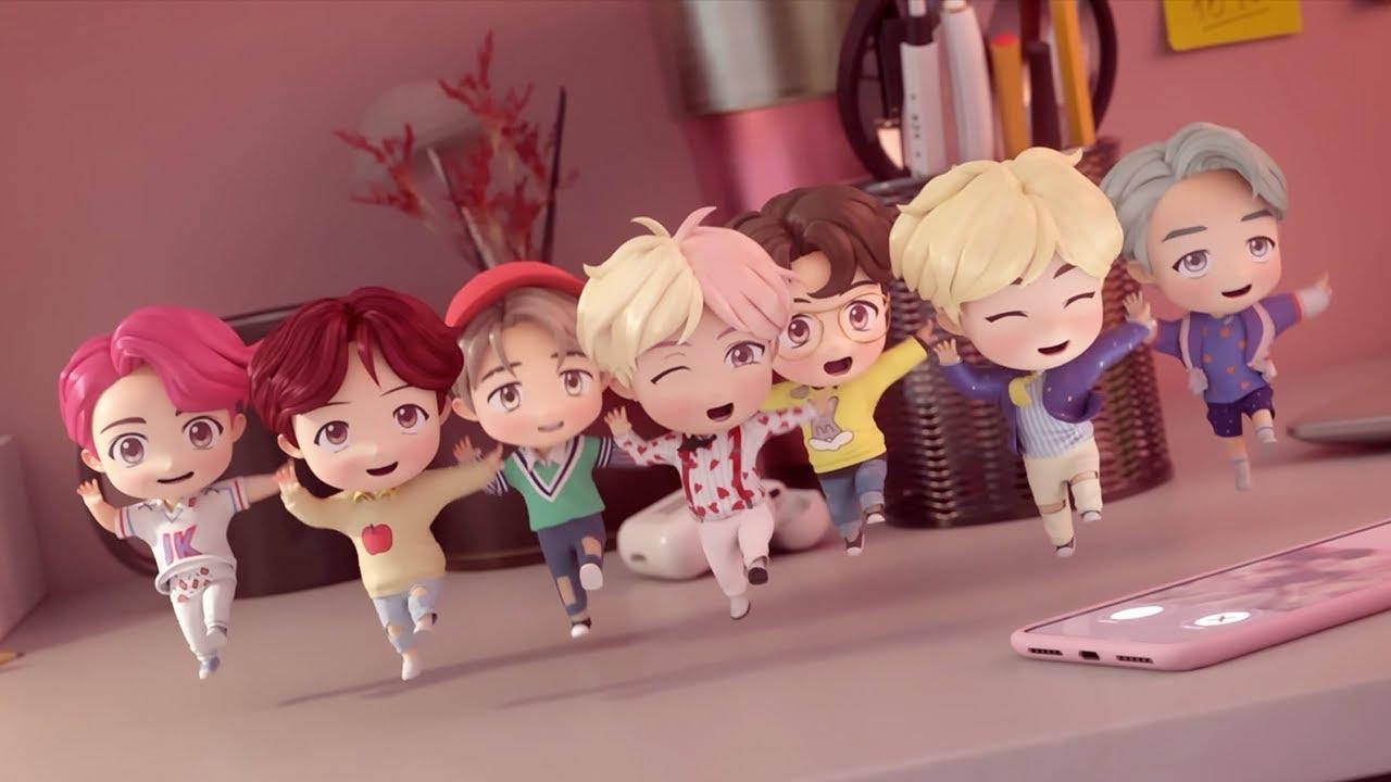 Personajele TinyTAN BTS dansând pe laptop Fundal