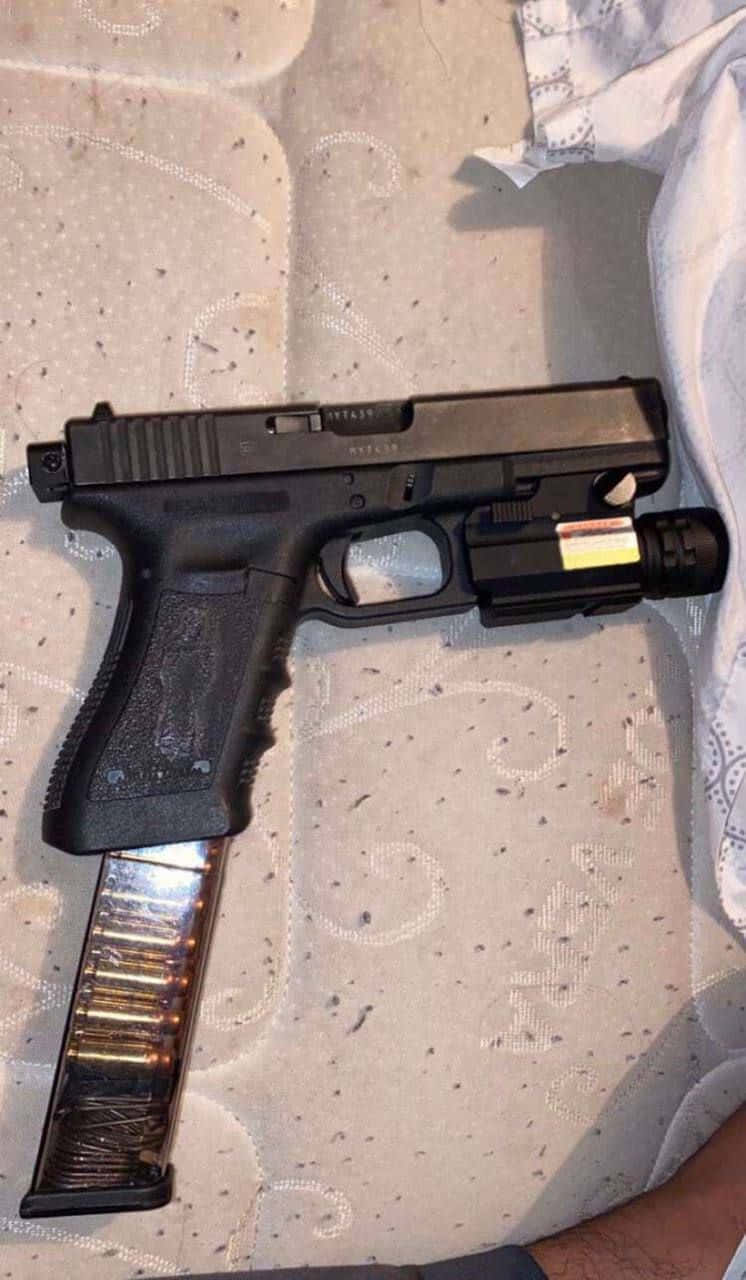 Pistol Reasamblat Imagine Fundal