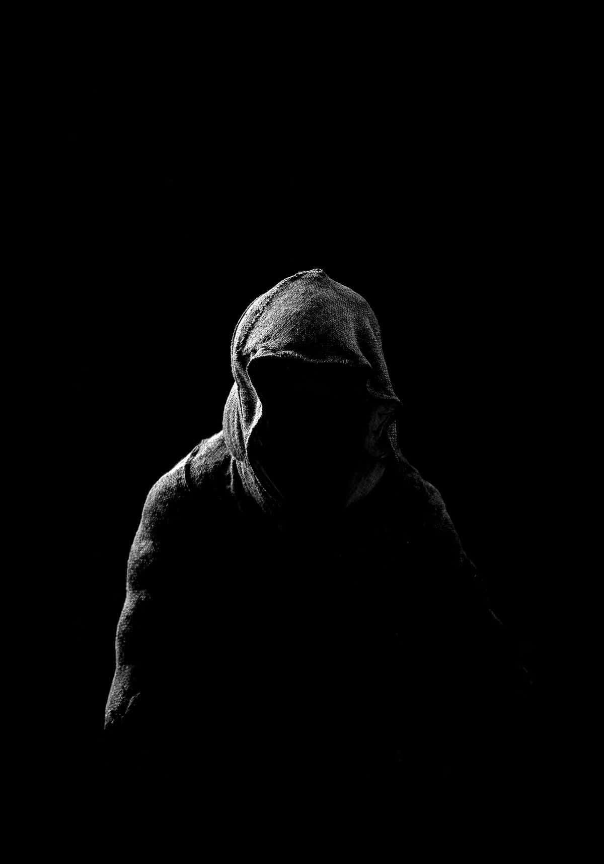 Profil întunecat al unui bărbat înfricoșător Fundal