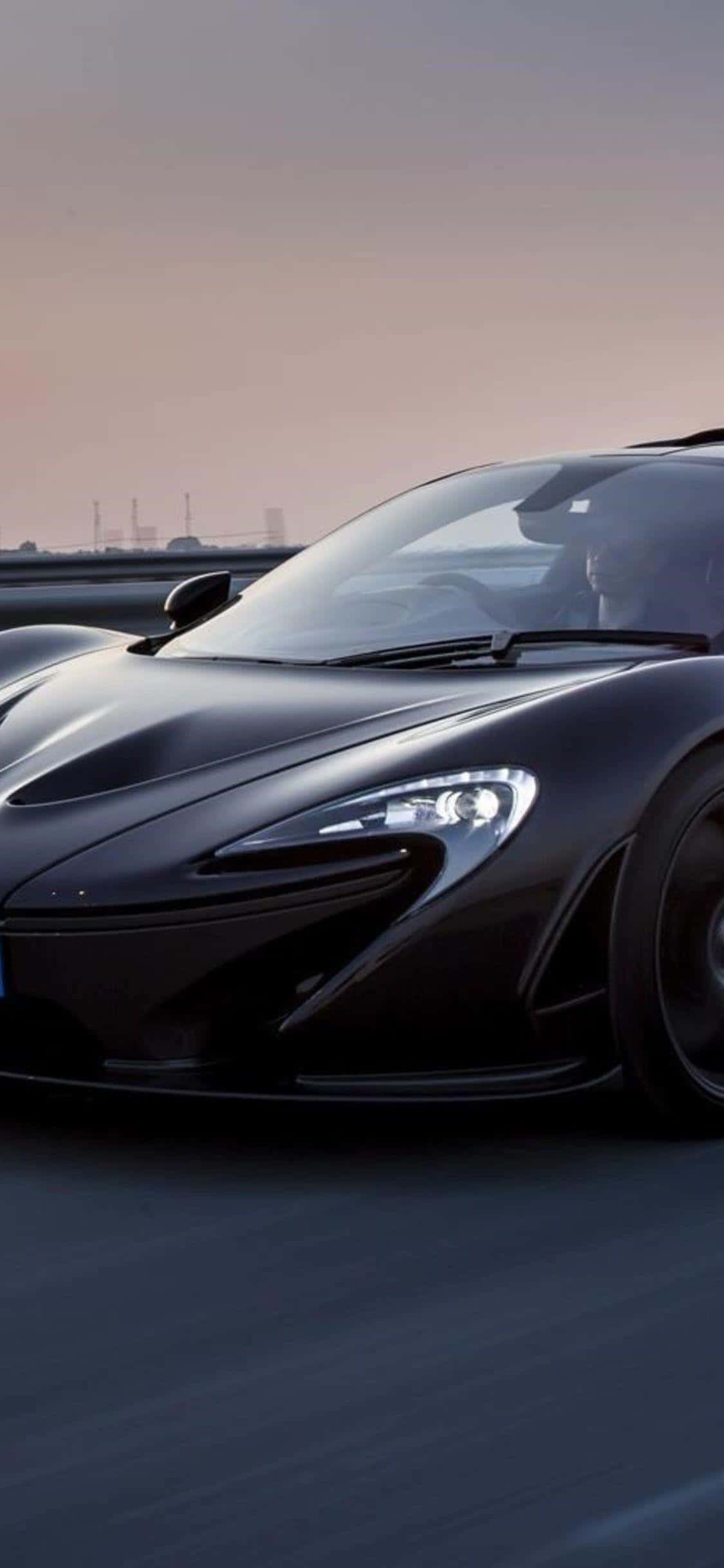 Pune-te la Volanul Luxosului iPhone Xs Mclaren 720s Fundal