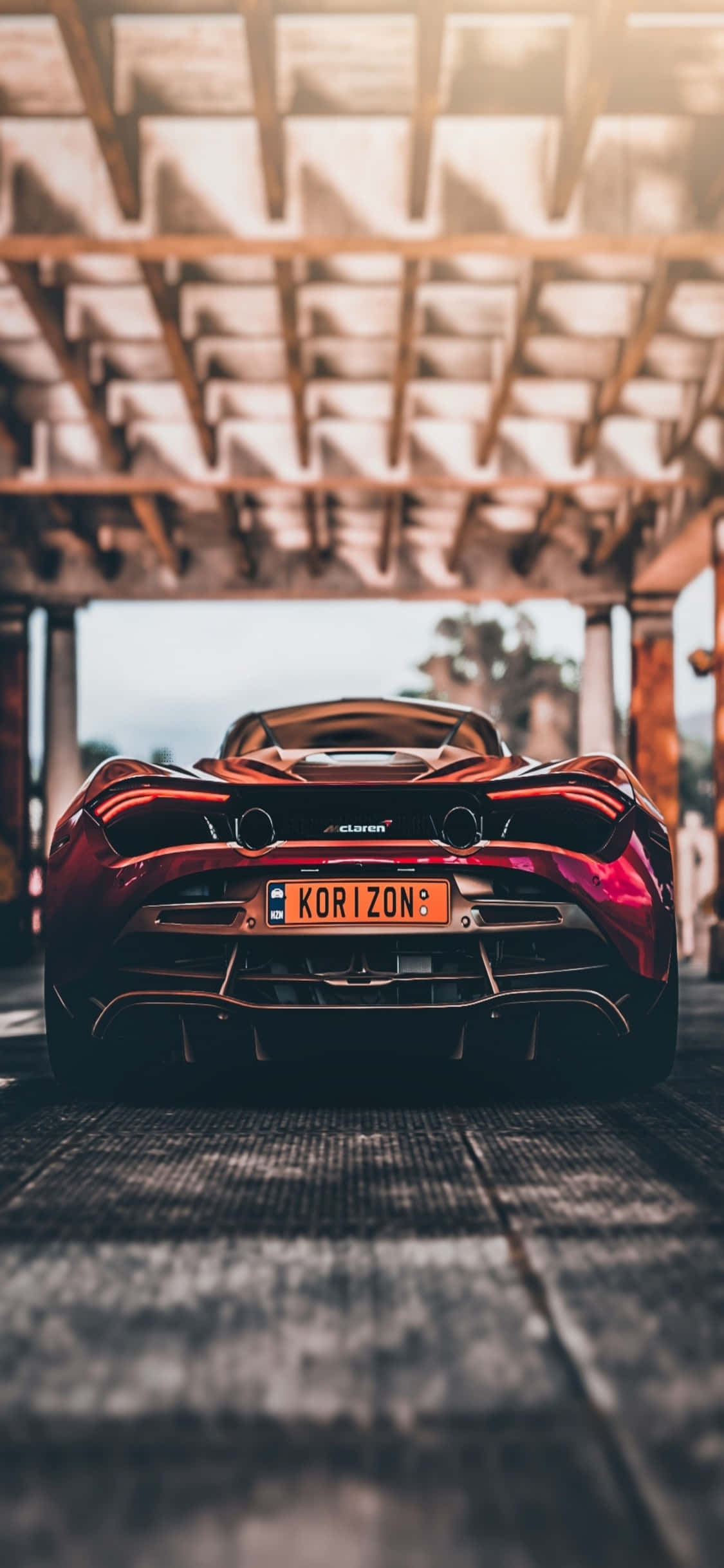 Pune-te la volanul iPhone Xs McLaren 720s Fundal