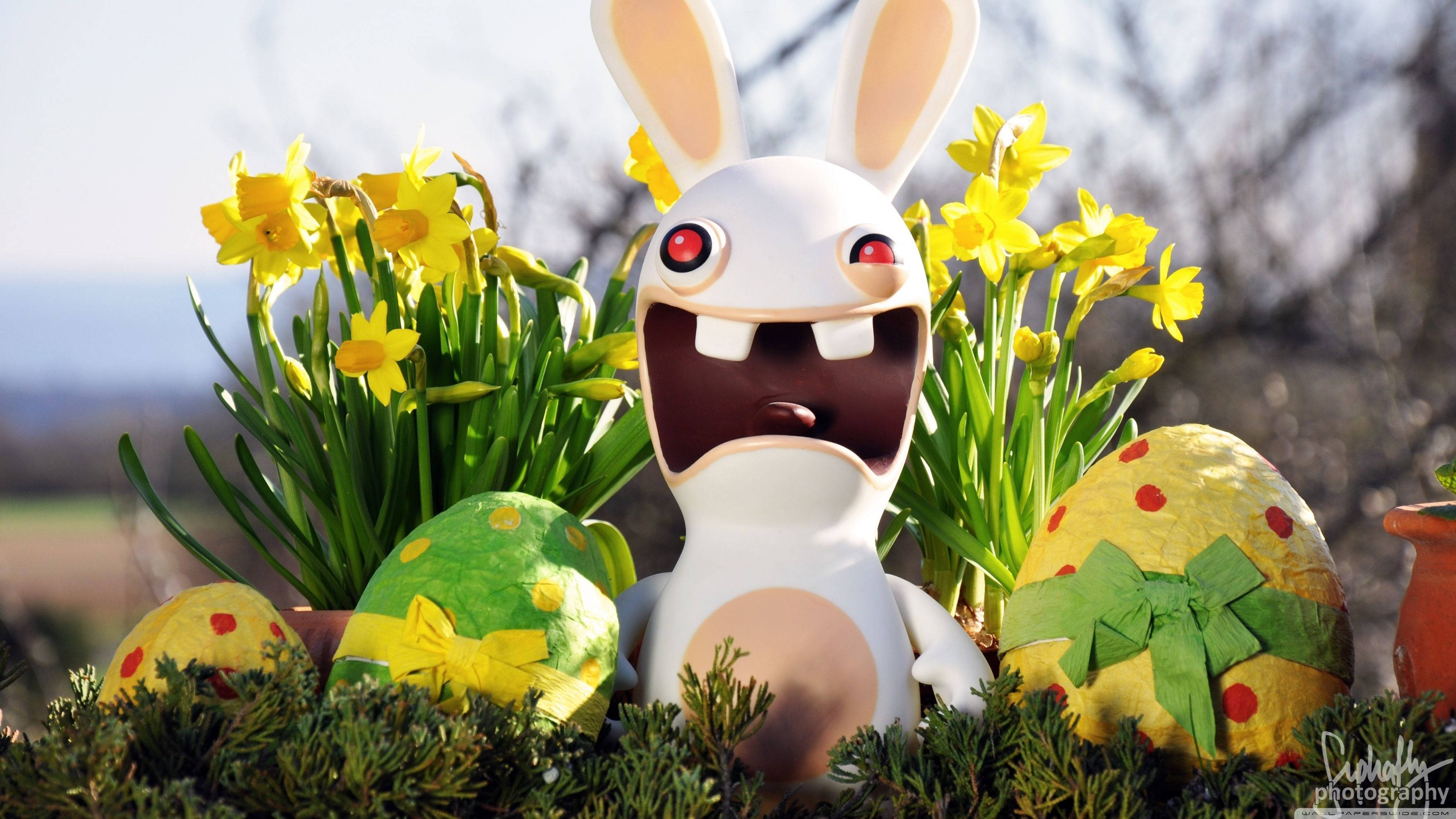Sărbătoriți Paștele cu aceste Ouă Rayman Rabbid Colorate Fundal