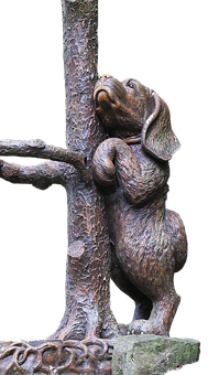 Sculptură de câine din bronz cu privirea în sus Fundal