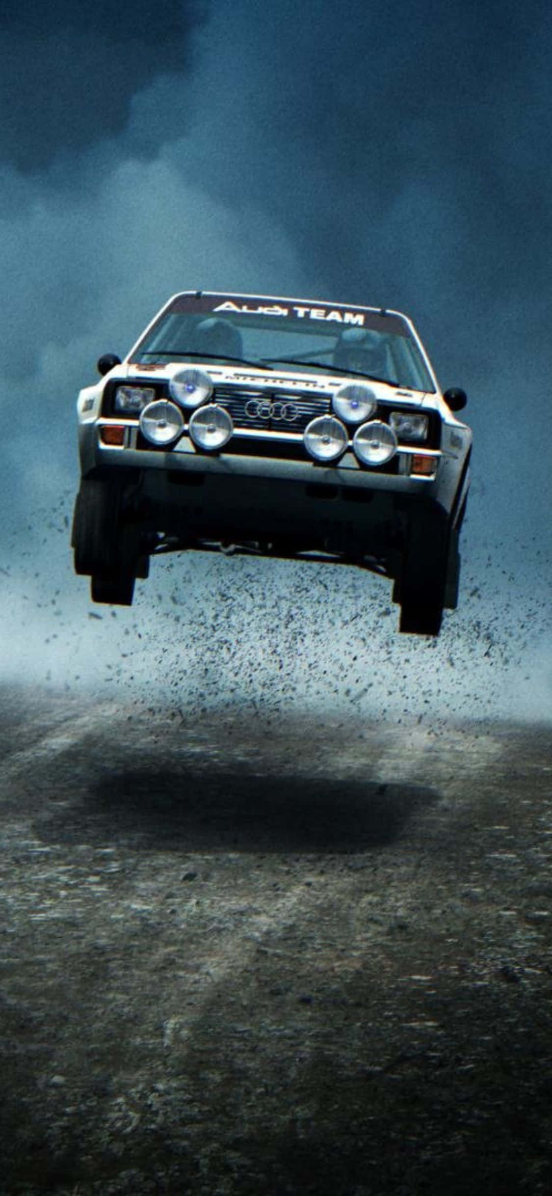 Simte emoția intensă cu iPhone Xs Dirt Rally Fundal