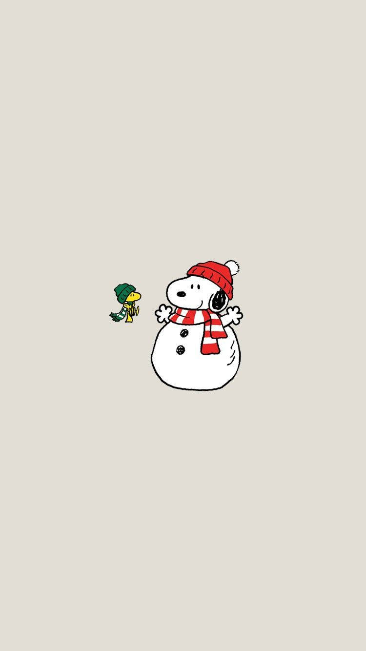 Snoopy Om de Zăpadă de Crăciun Fundal