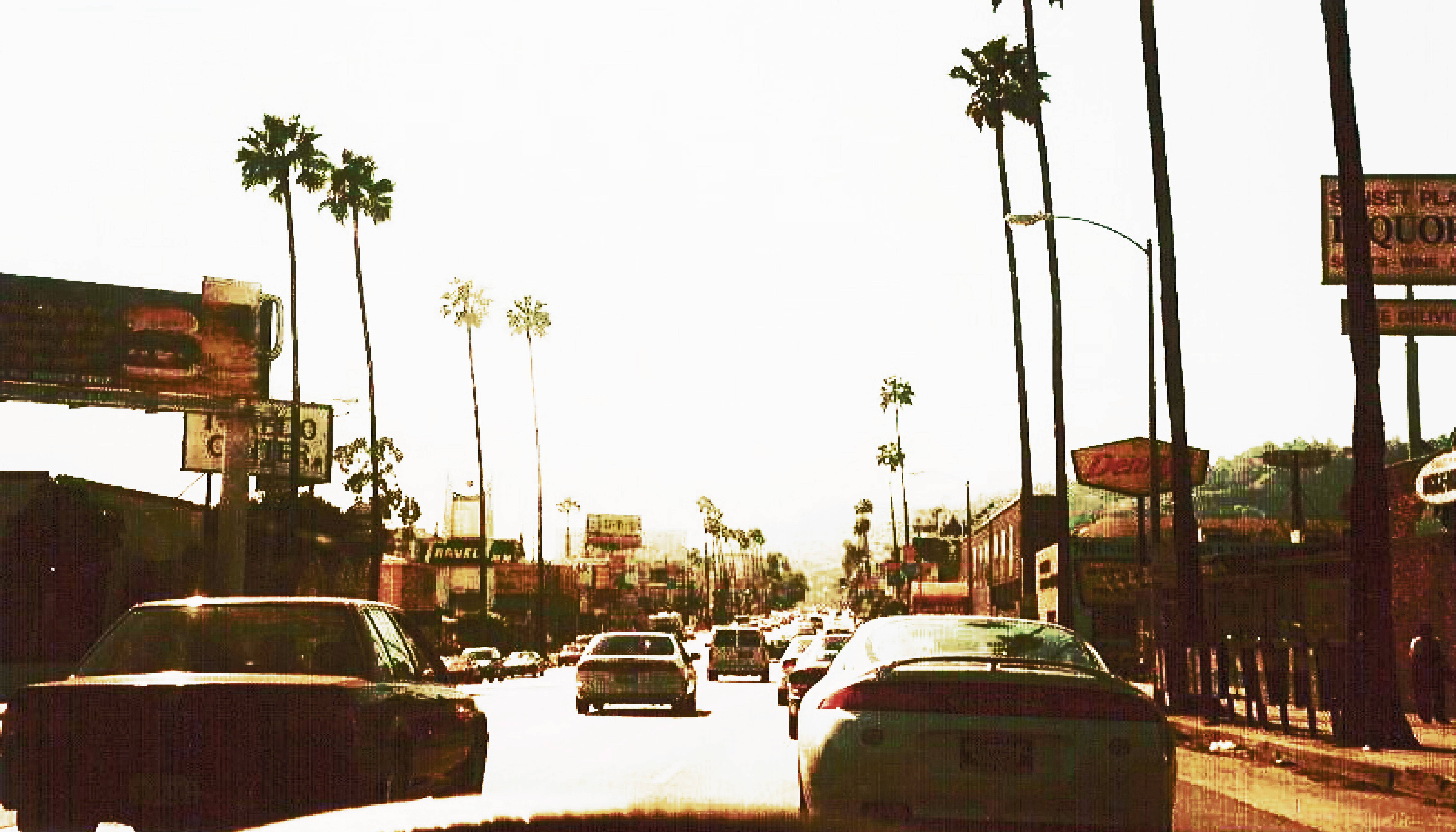 Soarele Orbitor de pe Sunset Boulevard Fundal