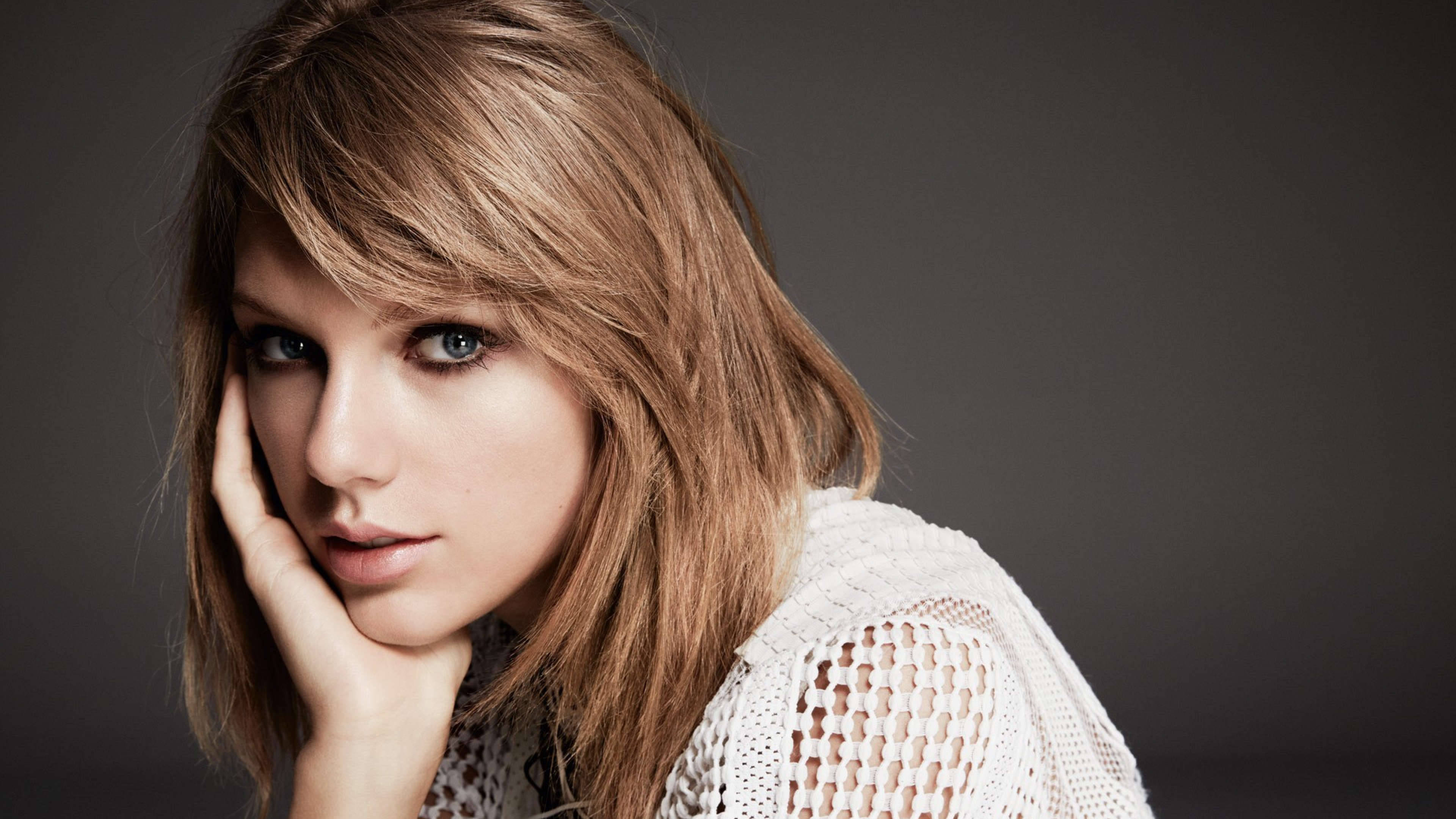 Taylor Swift în stilul său whimsical caracteristic. Fundal