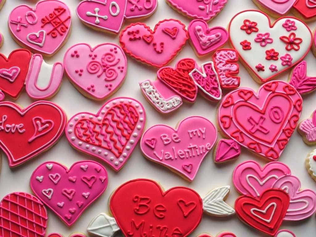 Trandafirii dulci de Valentine's Day în roz Fundal