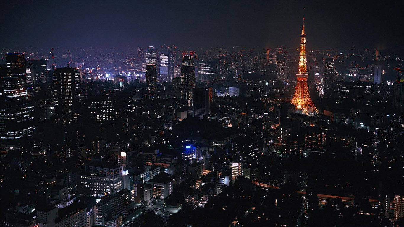 Turnul Tokyo iluminat noaptea Fundal