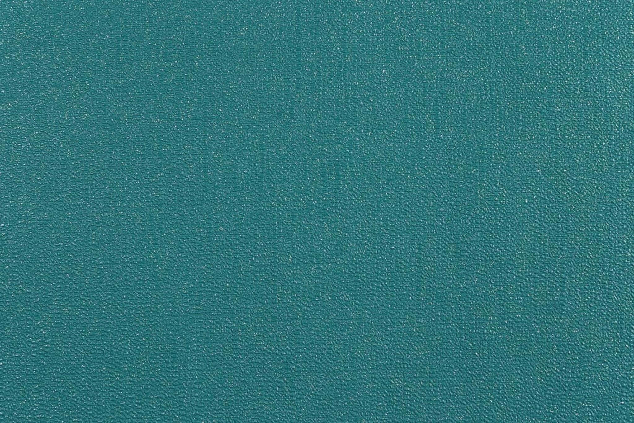 Un fundal verde smaragd intens, perfect pentru proiecte elegante Fundal