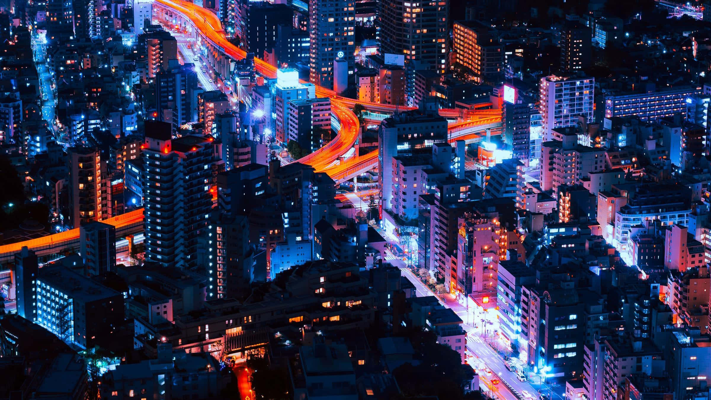Un peisaj urban vibrant și energic, luminat de neon. Fundal