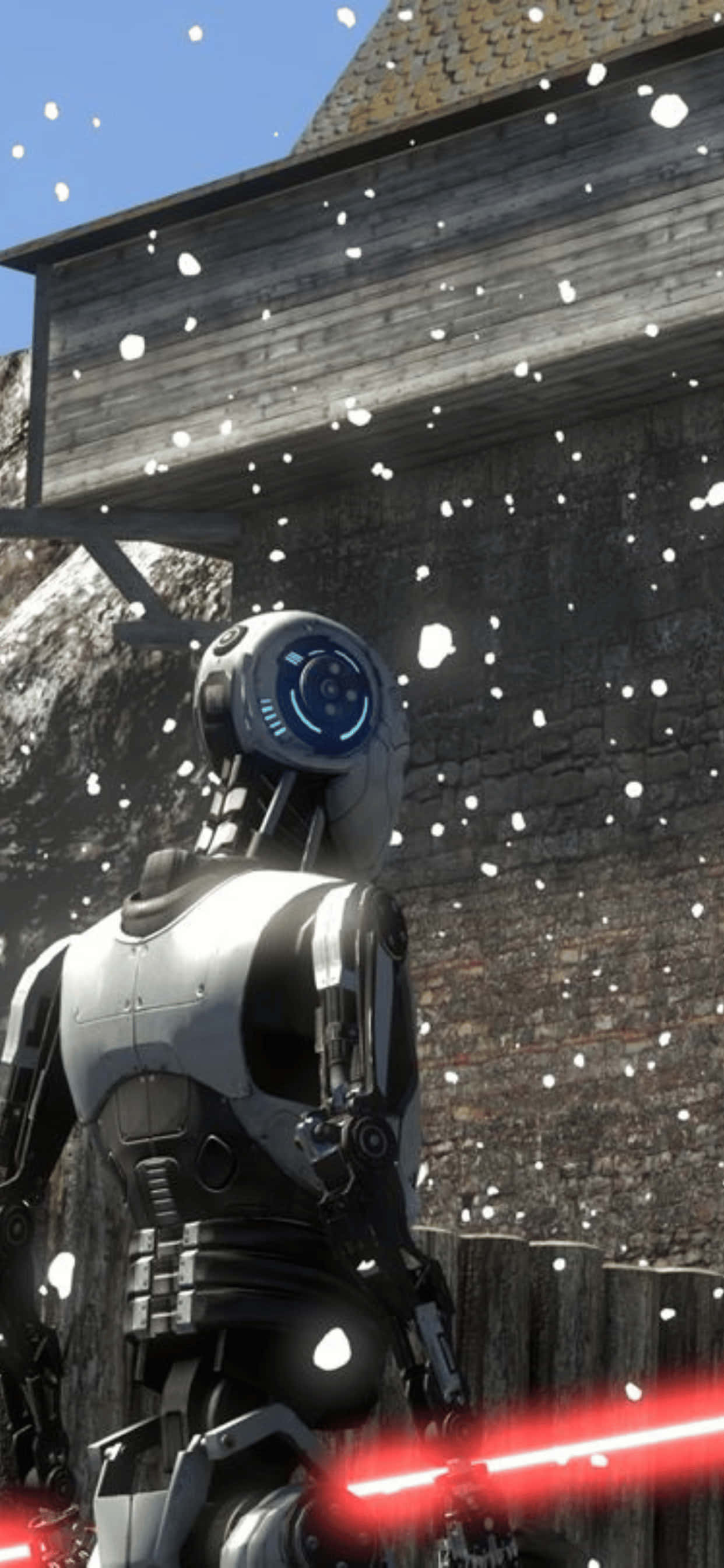 un robot Star Wars stă în zăpadă Fundal