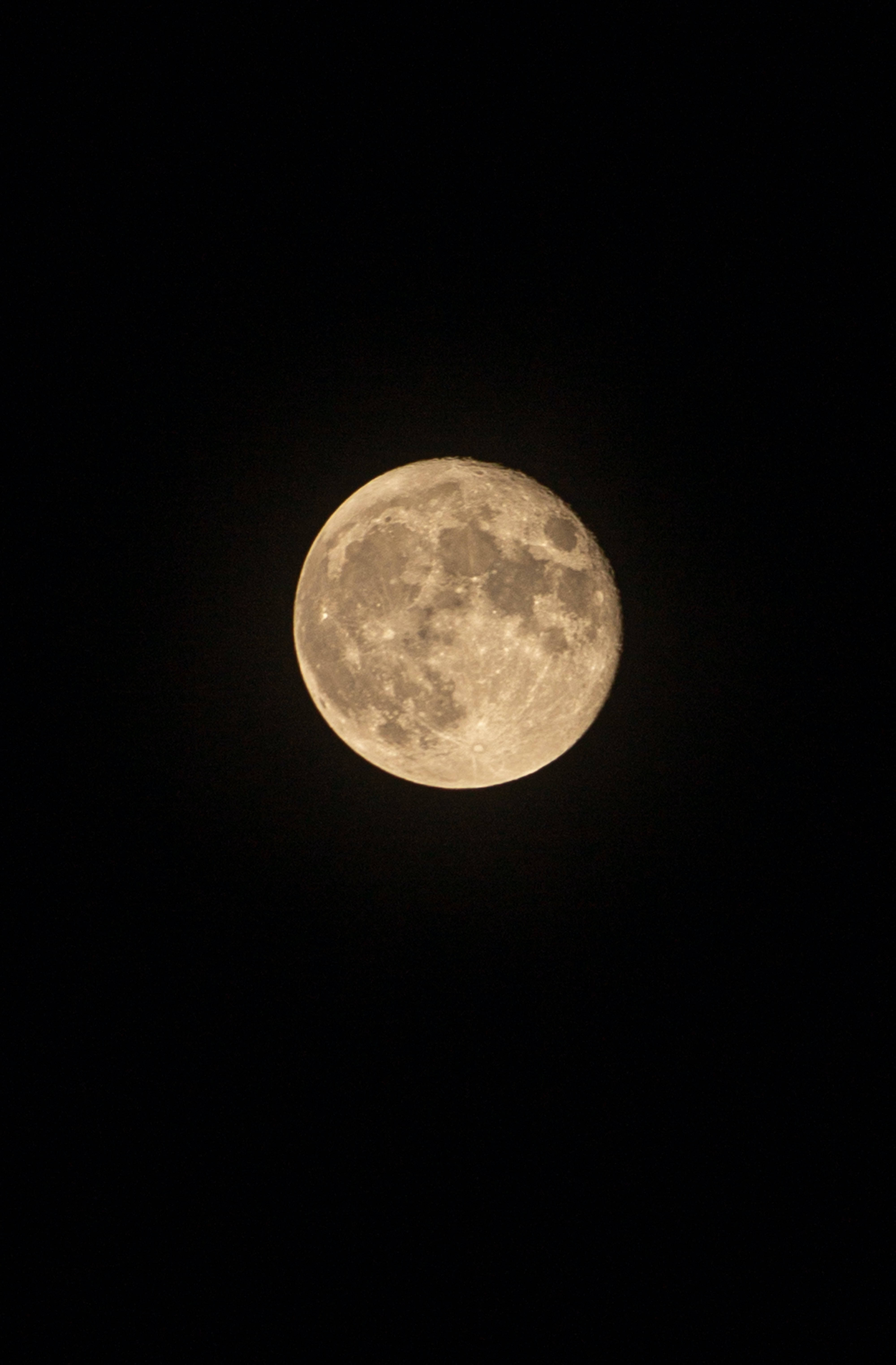 Vedere a craterelor de pe o lună plină Fundal