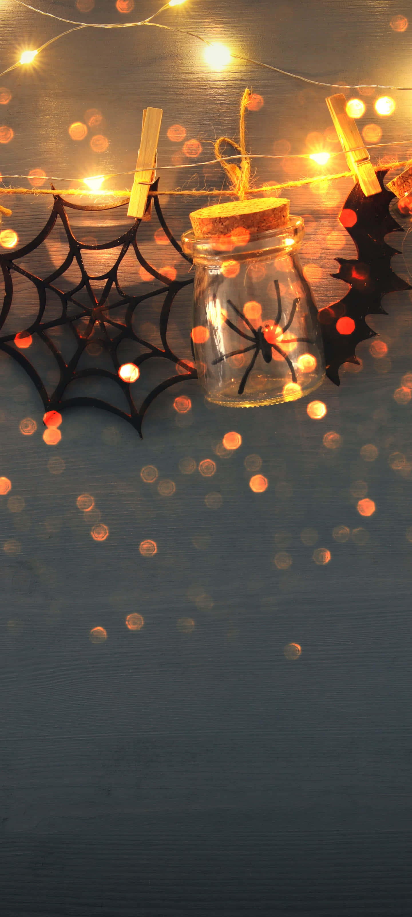 Vibrații înfricoșătoare peste tot în acest fundal de telefon inspirat de Halloween! Fundal