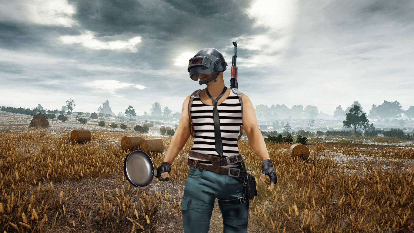 Victor în PUBG ținând tigaia 1366x768 Fundal