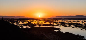 Fond de ecran apus de soare frumos Lacul Titicaca — Apus frumos Fundal
