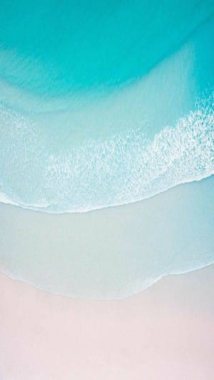 Fond de ecran iPhone 11 cu ocean aqua uimitor și țărm.