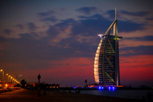 Burj Al Arab noaptea sub cerul înstelat — Ecran de blocare Fundal