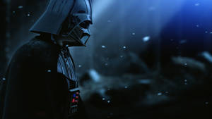 Fundal Războiul Stelelor cu Darth Vader în profil, cu zăpadă și fundal negru.