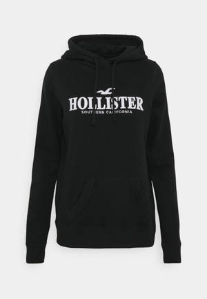 Jacheta hoodie neagră minimalistă Hollister wallpaper — Neutru Fundal
