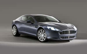 Elegantul Aston Martin Rapide S în mișcare — Steam Deck OLED Fundal
