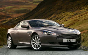 Elegantul Aston Martin DB9 pe Drum Deschis — Steam Deck OLED Fundal