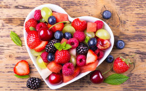 Assorted Berries On Heart-Shaped Bowl wallpaper — 16:10 Fundal