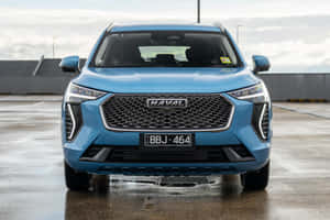 Haval SUV Elegant și Modern Conducând prin Peisaj Vast — MacBook Pro Fundal