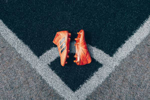 Tapet cu ghete de fotbal Adidas pe arcul de colț
