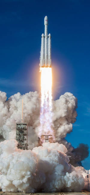 Fond de ecran lansare SpaceX Falcon Heavy — iPhone 18 Pro Fundal