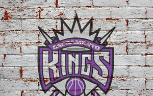 Fond de ecran Logo Sacramento Kings în perete de cărămidă — 16:10 Fundal