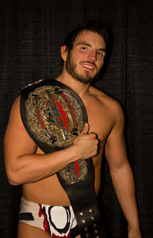 Luptătorul Johnny Gargano cu centura de campion la categoria grea — RedMagic Astra 2 Fundal