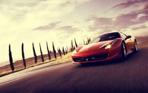 Tapet auto cu un Ferrari 458 Italia roșu în mișcare.
