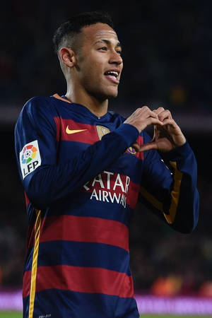 Wallpaper Neymar Jr. simbolul inimii în mână.