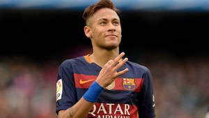 Neymar jr. arată semnul cu 3 degete în tricoul FC Barcelona wallpaper.