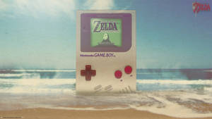 Wallpaper Nintendo Game Boy gigant la plajă