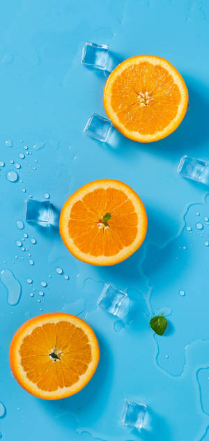 Fond de ecran OnePlus Oranges And Ice — iPhone 15 Fundal