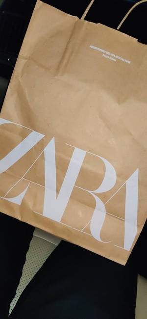 Wallpaper Zara Paper Bag pentru telefon. — iPhone 11 Pro Max Fundal