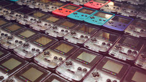 Fundal de ecran cu rânduri de modele Game Boy Color