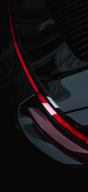 iPhone XR wallpaper of black car with red strip taillights — iPhone 14 Pro Fundal