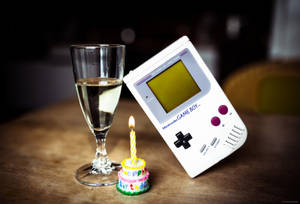 Tapet Game Boy replică cu sticlă și prăjitură