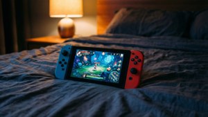 Tapet confortabil de noapte cu un Nintendo Switch pe pat, ecranul strălucind imagine de fundal